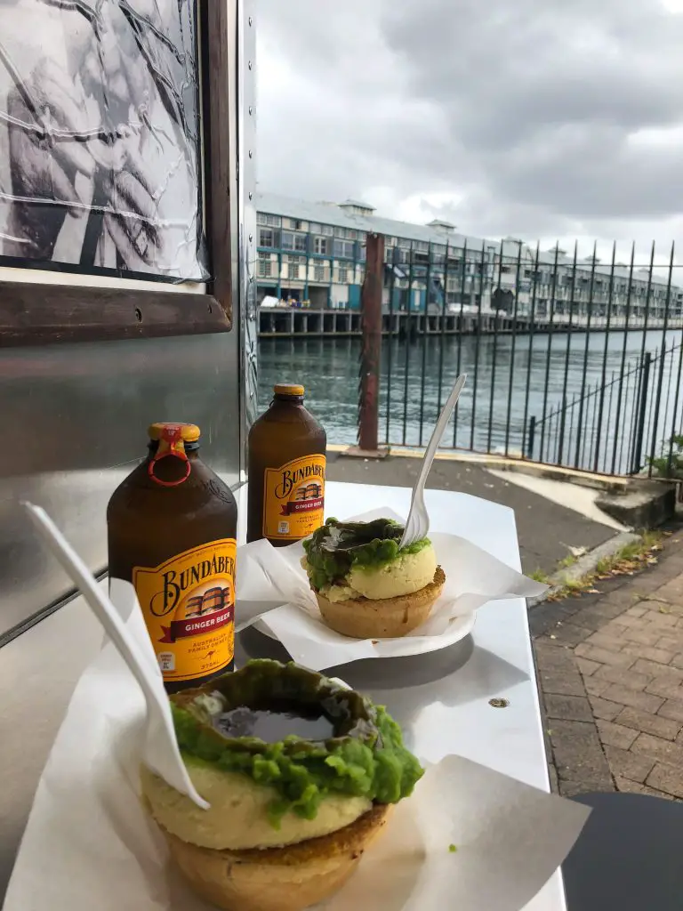 Photo of Harry's famous meat pies and Bundaberg Ginger Beers from Harry's Cafe de Wheels the best food in Sydney Australia.