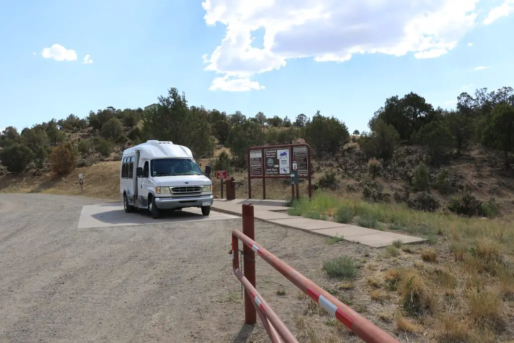 Shellby the Shuttle bus parked near the entrance of Crawford State Park