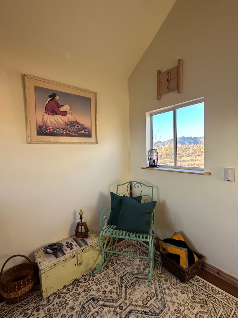 Photo of R.C. Gorman's Chili Peppers print hanging on the wall in our desert office shack for Applied Worldwide blog "Buying R.C. Gorman Art at the Thrift in Arizona"