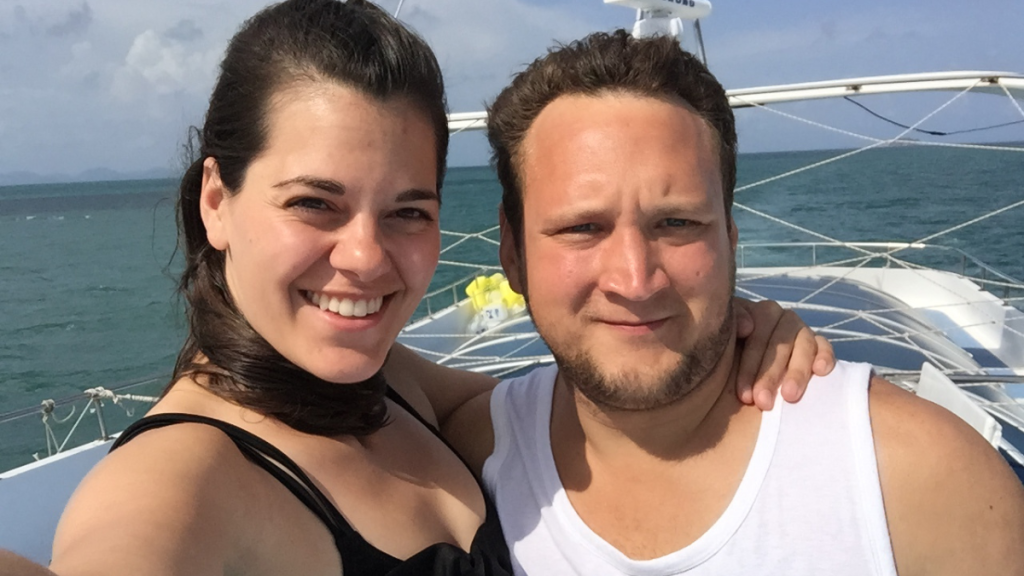 Photo of Stephanie and Luke on a dive boat in Phuket Thailand for Applied Worldwide blog Why Thailand Is One of the Most Romantic Places to Propose