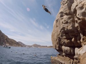 Photograph of Luke Hanna Jumping off Pelican Rock in Cabo San Lucas, Mexico during Spring Break