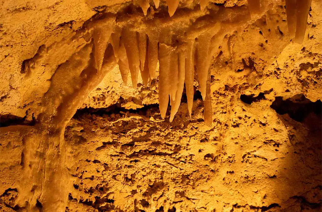 Close-up photo of calcite crystal formations inside the Caverns of Sonora.