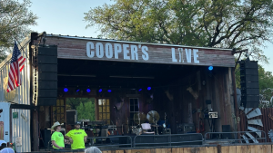 Photo of the stage at Cooper's BBQ Texas Live for Applied Worldwide Lifestyle blog "Cooper's BBQ Live: Brisket, Live Music, and Texas Charm"