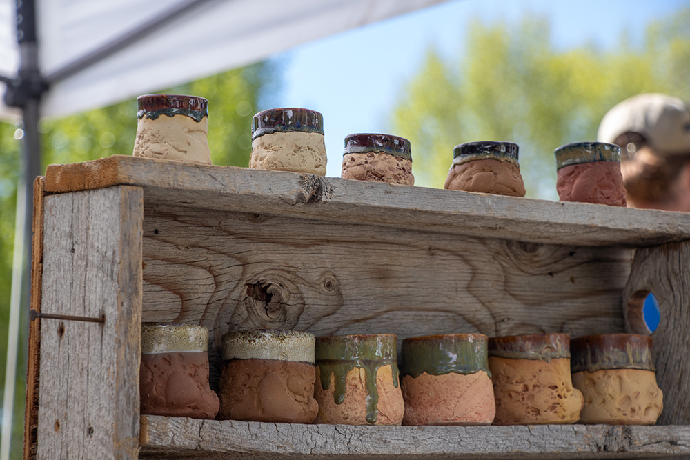 Photo of hand thrown clay mugs at the Hartman Castle Art Fair for Applied Worldwide blog "Hartman Castle Welcome Community for First Time in Century"
