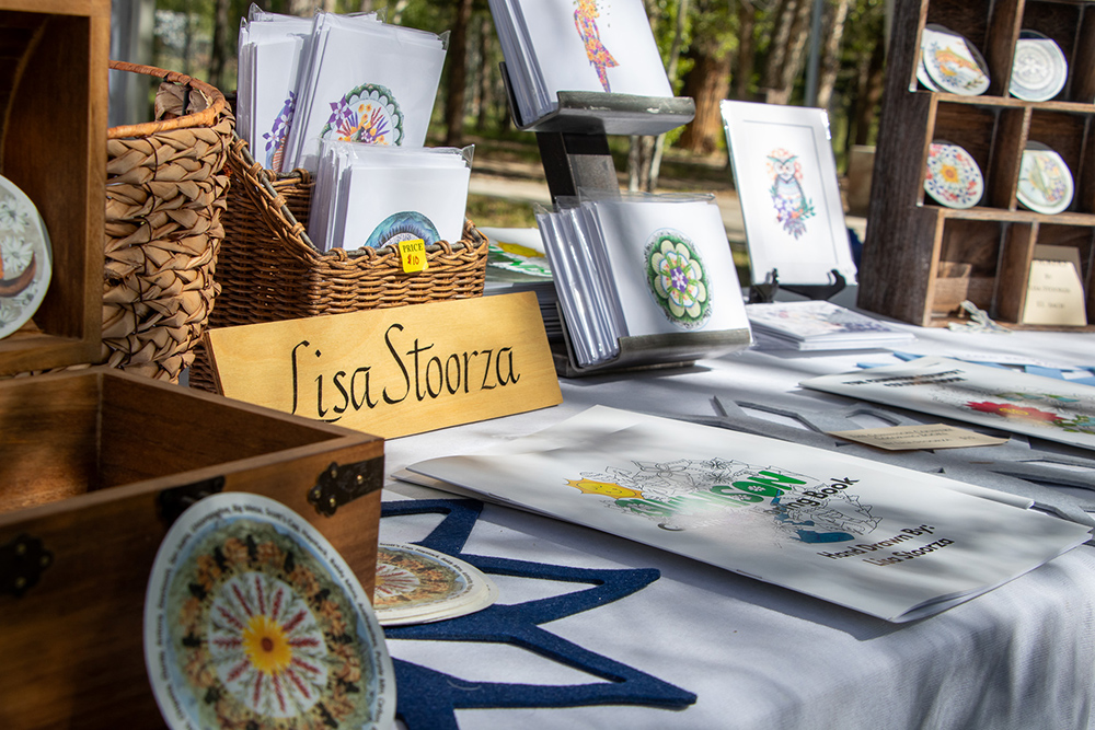 Photo of vender booth at the Hartman Castle Art Fair for Applied Worldwide blog "Hartman Castle Welcome Community for First Time in Century"