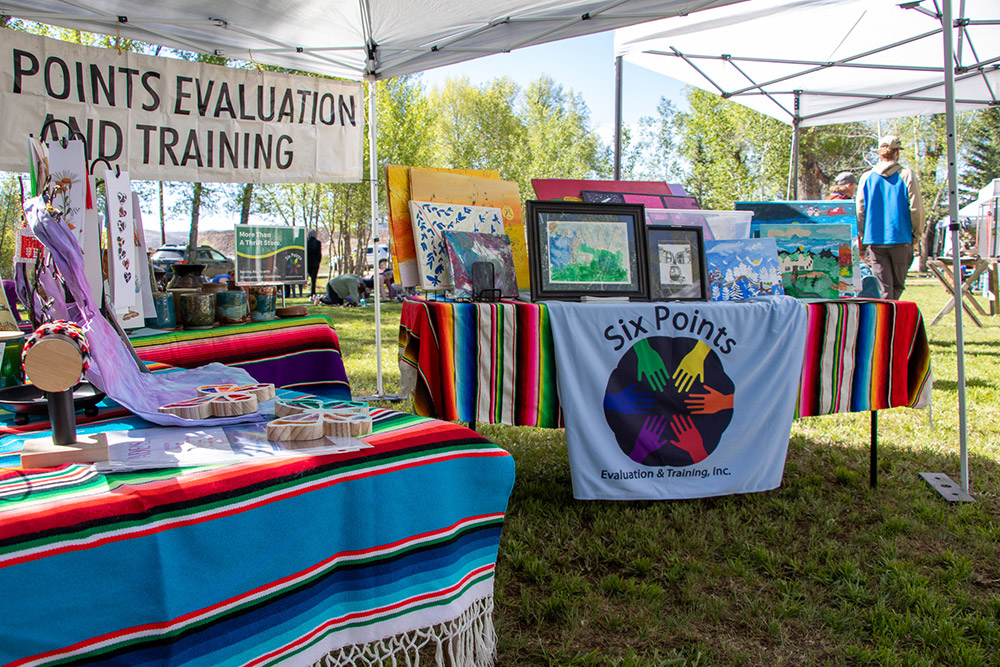 Photo of Six Points Thrift Store booth at the Hartman Castle Art Fair for Applied Worldwide blog "Hartman Castle Welcome Community for First Time in Century"