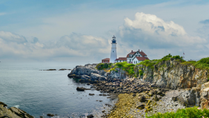 Photo of a lighthouse on the coast of Maine for Applied Worldwide Lifestyle blog "How to Build a Vacation That Recharges and Excites You"