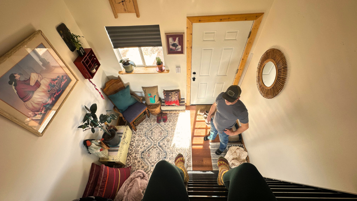 Photo of Stephanie and Luke's off-grid home office from the bird's eye view from the loft.